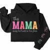 10-1-6.webp This Mama Wears Her Heart on Her Sleeve Hoodie – Custom Kids Names, Mother's Day