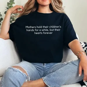 13-2-8.webp Mothers Hold Their Children’s Hands Shirt – Sentimental Mom Quote Tee, Mother’s Day Gift, Heartfelt Mama Shirt, Mom Life Apparel