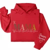 15-1-7.webp This Mama Wears Her Heart on Her Sleeve Hoodie – Custom Hoodie with Kids’ Names, Personalized Mother’s Day Gift for Mama