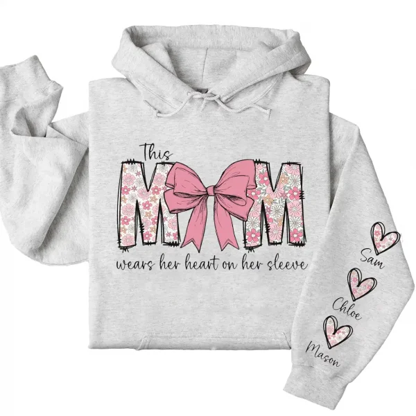 This Mom Wears Her Heart on Her Sleeve Hoodie – Custom Mama Shirt with Kids’ Names, Personalized Mother’s Day Gift, Cute Sweatshirt for Mom