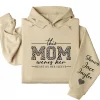 18-1-5.webp This Mom Wears Her Heart on Her Sleeve Hoodie – Personalized Mom Life Shirt with Kids’ Names, Mother’s Day Gift, Cute Blessed Mama Tee