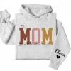 18-1-6.webp This Mama Wears Her Heart on Her Sleeve Hoodie – Custom Hoodie with Kids’ Names, Personalized Mother’s Day Gift for Mama