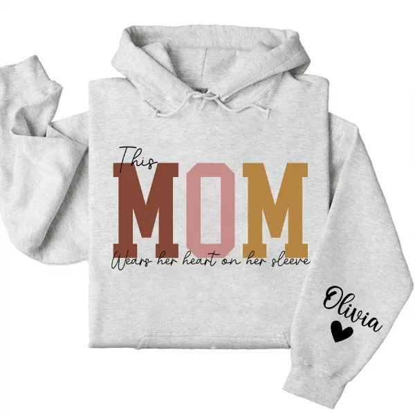 18-1-6.webp This Mama Wears Her Heart on Her Sleeve Hoodie – Custom Hoodie with Kids’ Names, Personalized Mother’s Day Gift for Mama