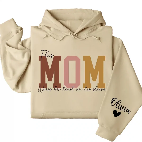 18-4-5.webp This Mama Wears Her Heart on Her Sleeve Hoodie – Custom Hoodie with Kids’ Names, Personalized Mother’s Day Gift for Mama