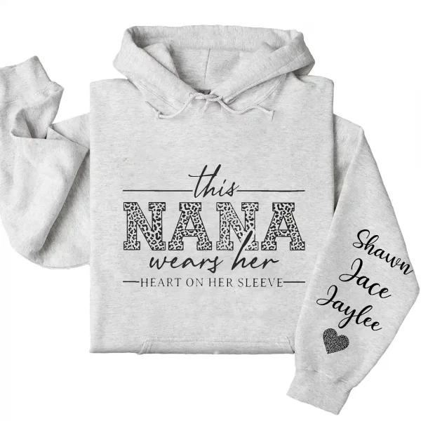 This Nana Wears Her Heart on Her Sleeve Hoodie – Personalized Grandma Shirt with Grandkids’ Names, Mother’s Day or Valentine’s Gift