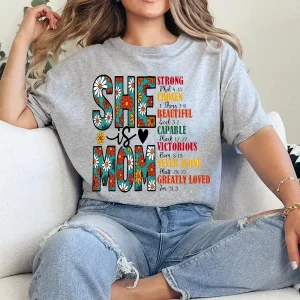 19-4-4.webp She Is Mom T-Shirt – Retro Christian Mom Shirt with Bible Verse, Blessed Mama Graphic Tee, Faith-Based Mother's Day Gift for Women