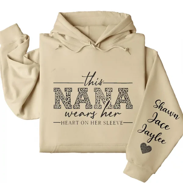 This Nana Wears Her Heart on Her Sleeve Hoodie – Personalized Grandma Shirt with Grandkids’ Names, Mother’s Day or Valentine’s Gift