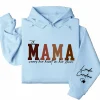 4-3-9.webp Custom This Mama Wears Her Heart On Her Sleeve Hoodie – Personalized Mom Shirt, Mother’s Day Gift for New Moms