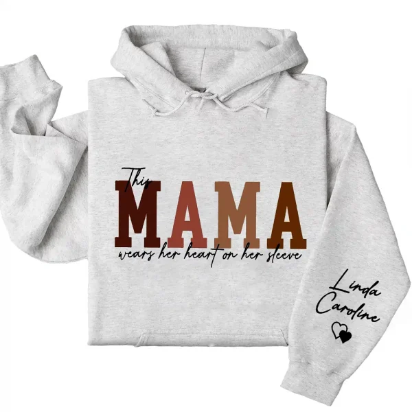 4-4-7.webp Custom This Mama Wears Her Heart On Her Sleeve Hoodie – Personalized Mom Shirt, Mother’s Day Gift for New Moms