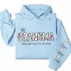 This Grandma Wears Her Heart on Her Sleeve Hoodie – Custom Hoodie with Kids’ Names, Personalized Mother’s Day Gift for Grandma