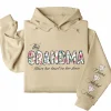This Grandma Wears Her Heart on Her Sleeve Hoodie – Custom Hoodie with Kids’ Names, Personalized Mother’s Day Gift for Grandma