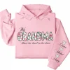 This Grandma Wears Her Heart on Her Sleeve Hoodie – Custom Hoodie with Kids’ Names, Personalized Mother’s Day Gift for Grandma