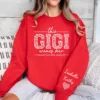 Custom Gigi Sweatshirt, Custom Grandma Gift, This Gigi Wears Her Heart On Her Sleeve Sweater, With Kids' Names On Sleeve, Gigi Gift on Mother's Day