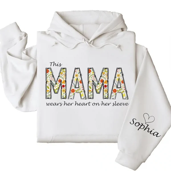 7-3-9.webp This Mama Wears Her Heart on Her Sleeve Hoodie – Floral Hoodie for Mom with Kids’ Names, Cute Personalized Gift Idea