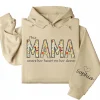 7-4-6.webp This Mama Wears Her Heart on Her Sleeve Hoodie – Floral Hoodie for Mom with Kids’ Names, Cute Personalized Gift Idea
