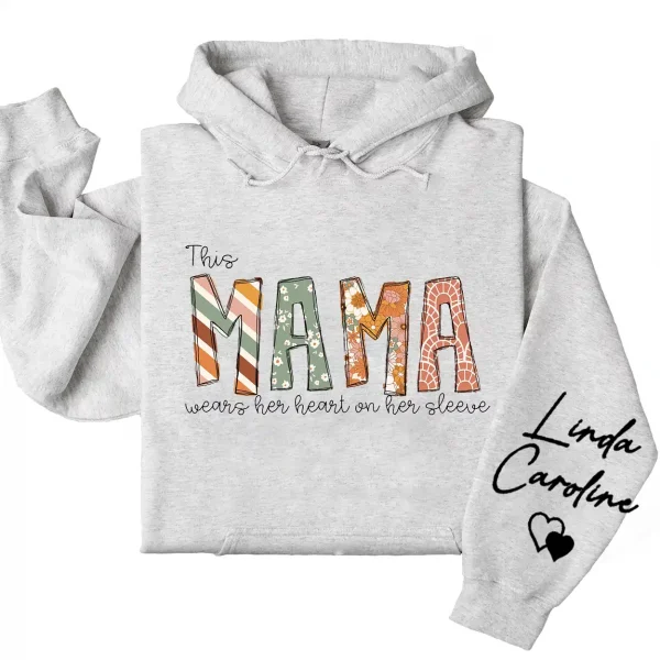 9-4-5.webp This Mama Wears Her Heart on Her Sleeve Hoodie – Custom Kids Names Hoodie for Mom