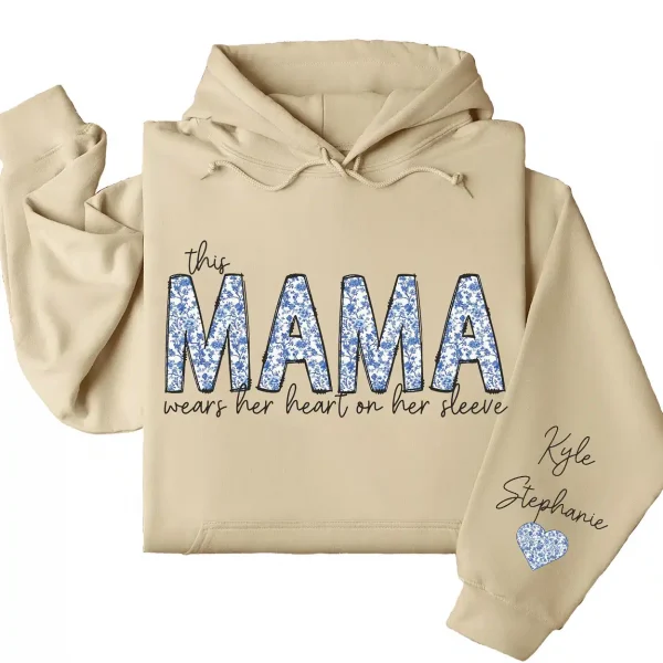 9-4-7.webp This Mama Wears Her Heart on Her Sleeve Hoodie – Custom Hoodie with Kids’ Names, Personalized Mother’s Day Gift for Mama
