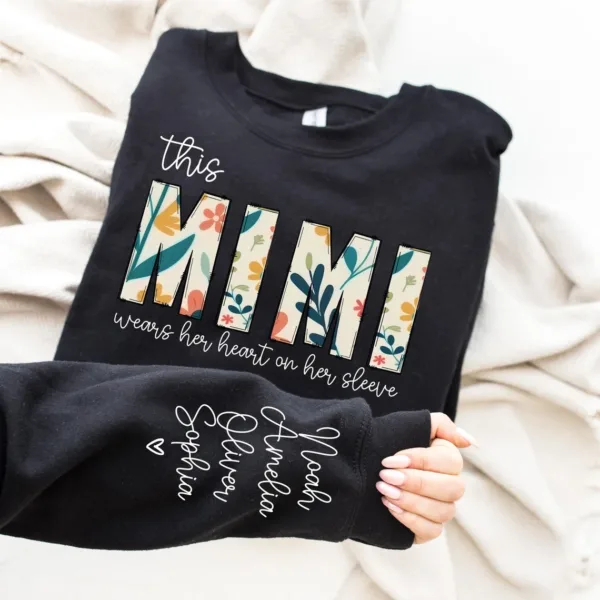 Mimi-Gift-Custom-Christmas-Gift-for-Mimi-Sweatshirt-I-Wear-My-Heart-On-My-Sleeve-Kids-Name-on-Sleeve-Personalized-Gift-for-Mimi-Shirt-1.png Personalized This Mimi Wears My Heart On My Sleeve, Kids Name on Sleeve, Personalized Gift for Mimi Shirt