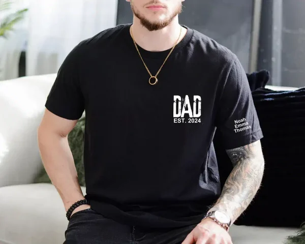 Personalized-Dad-Shirt-With-Kids-Names-Arm-1.webp Personalized Dad T-Shirt With Kids Names Arm, Custom Dad Tshirt For Dad, Est Date Daddy Shirt Gift for Fathers Day, Childs Names Arm, Dad Gift