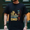 Personalized-Hooked-On-Being-Dad-Fishing-Shirts-2.webp Personalized Hooked On Being Dad Fishing Shirts, Vintage Dad Shirt, Best Dad T-Shirt, Funny Fishing Shirts For Men, Gifts For Fisherman