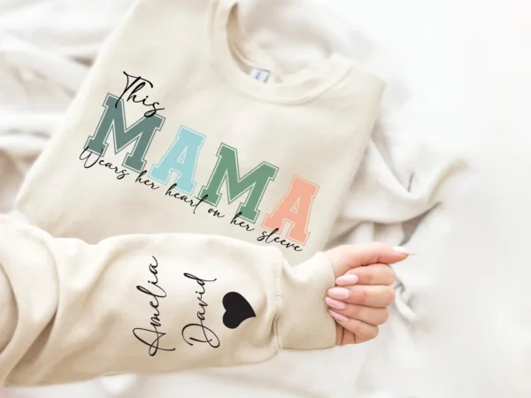 Personalized-This-Mama-Wears-Her-Heart-On-Her-Sleeve-Hoodie-Personalized-Mom-Sweatshirt-With-Kids-Names-Cute-Momma-Mothers-Day-Gifts-2.jpg Personalized This Mama Wears Her Heart on Her Sleeve Sweatshirt, Custom Kids Name on Sleeve, Mothers Day Gift, Gift for Mom Sweatshirt, Mom Life