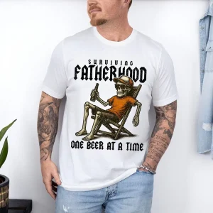 Surviving-Fatherhood-2.webp Surviving Fatherhood One Beer At A Time T-Shirt, Funny Dad, Skeleton Dad Shirt, Drinking Husband, Fatherhood Shirt, Father's Day Gift